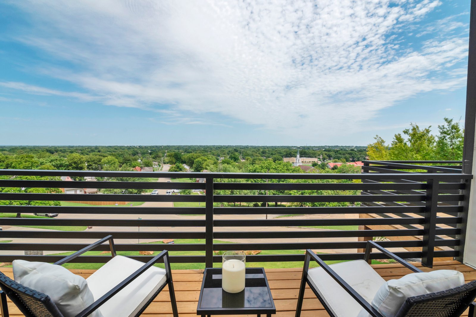 This image highlights a stunning balcony with panoramic views,